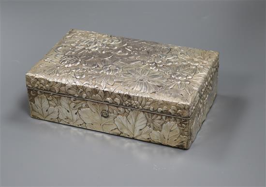 An early 20th century Japanese white metal, jungin mark, cigar/cigarette box, 24.5cm.